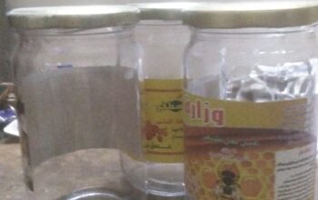 علب عسل فارغة زجاجية مستعملة للبيع